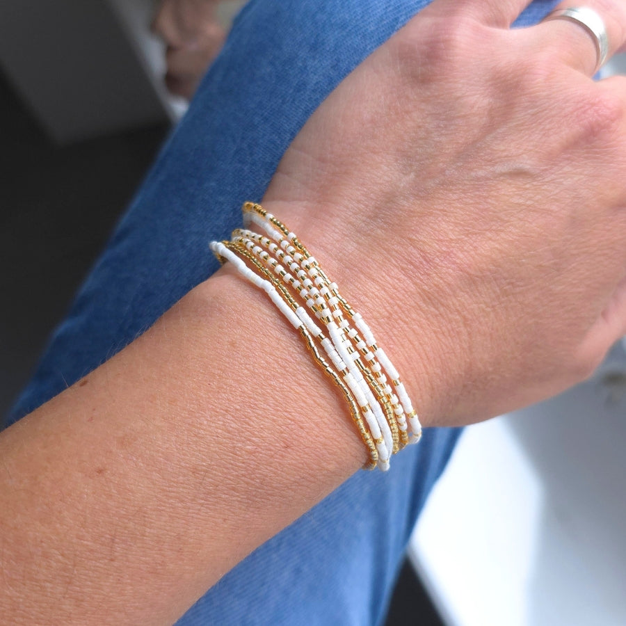 Halskette/Armband aus Gold und Weiß