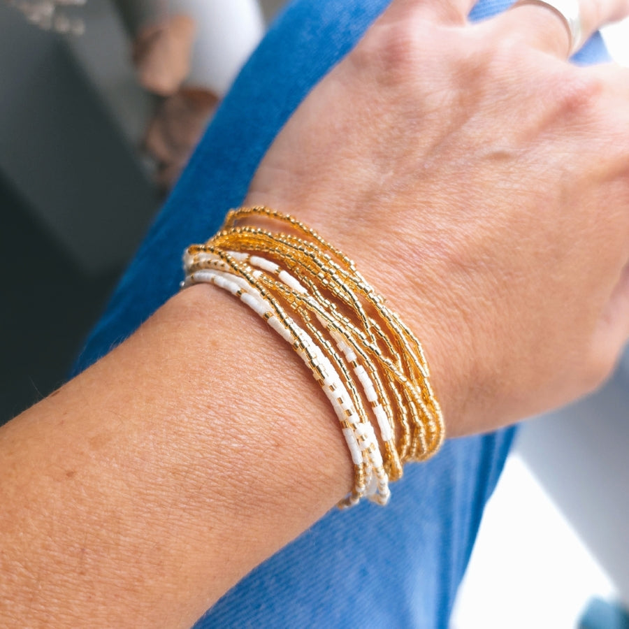 Halskette/Armband aus Gold und Weiß
